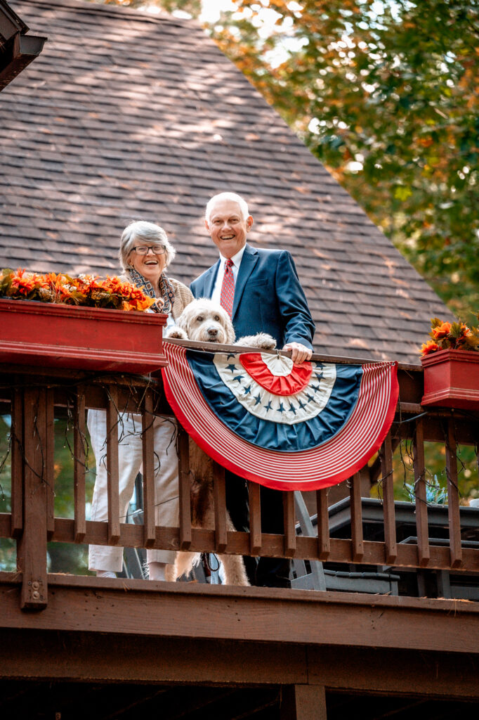 brides parents on a balcony