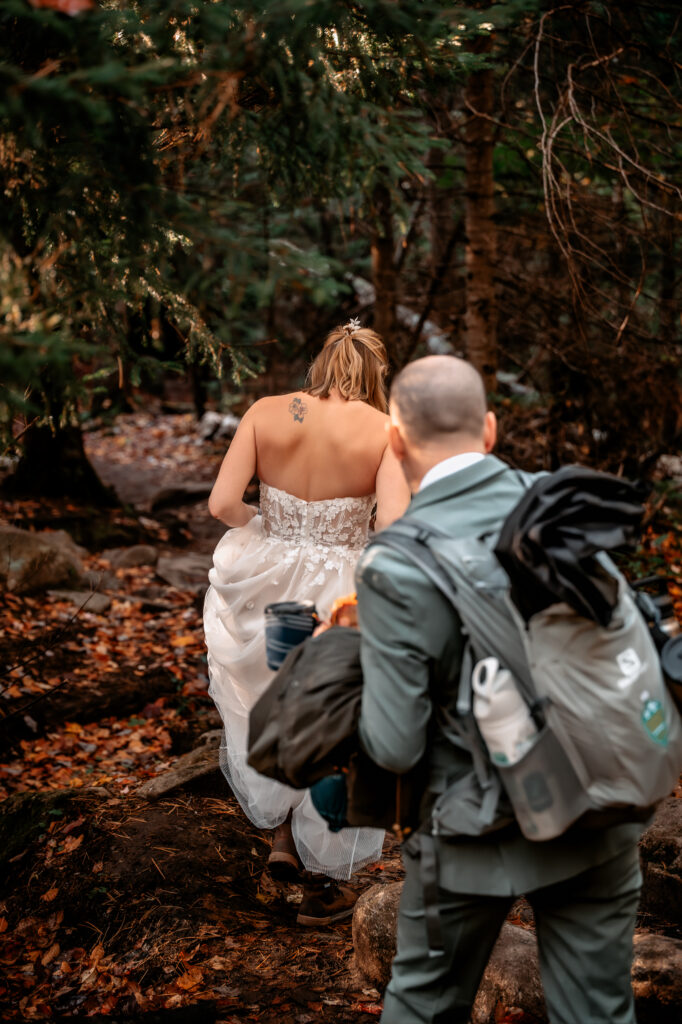 bride and groom hiking