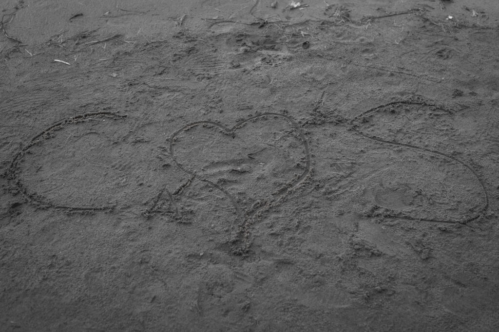 c loves s in the sand