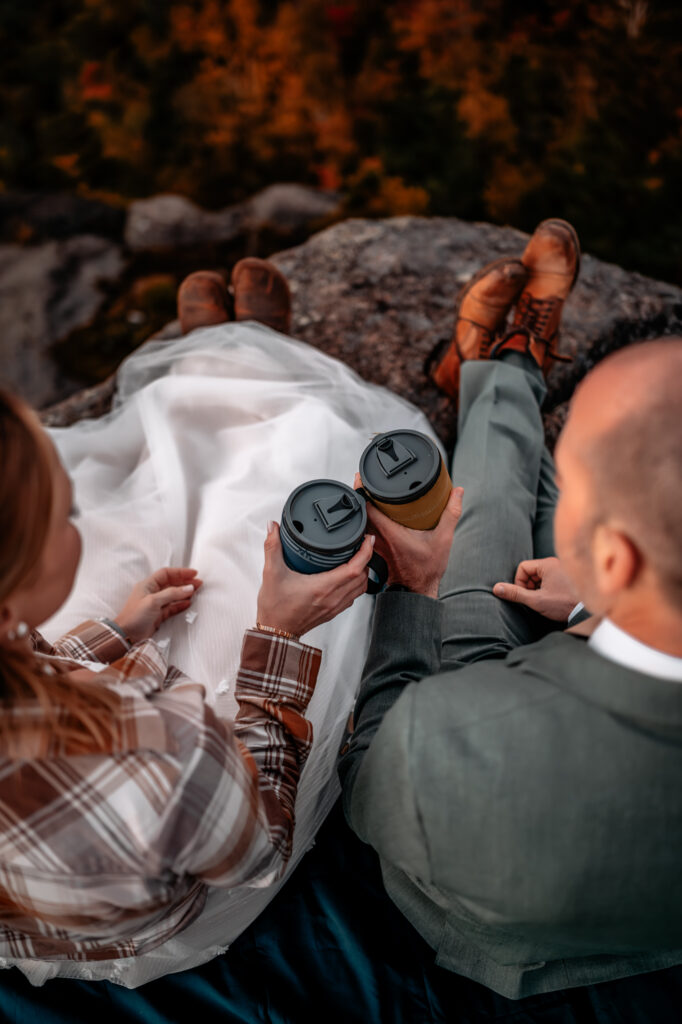 bride and groom cheers coffee cups