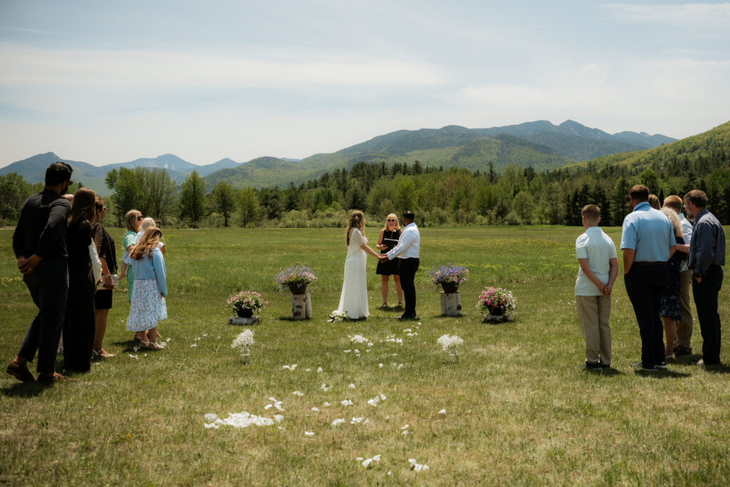 A couple has an elopement with family near Lake Placid.