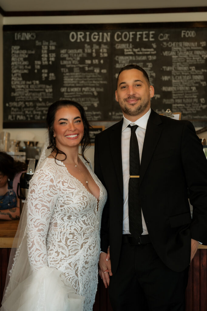 Bride and groom get coffee at origin coffee co in the adirondacks.