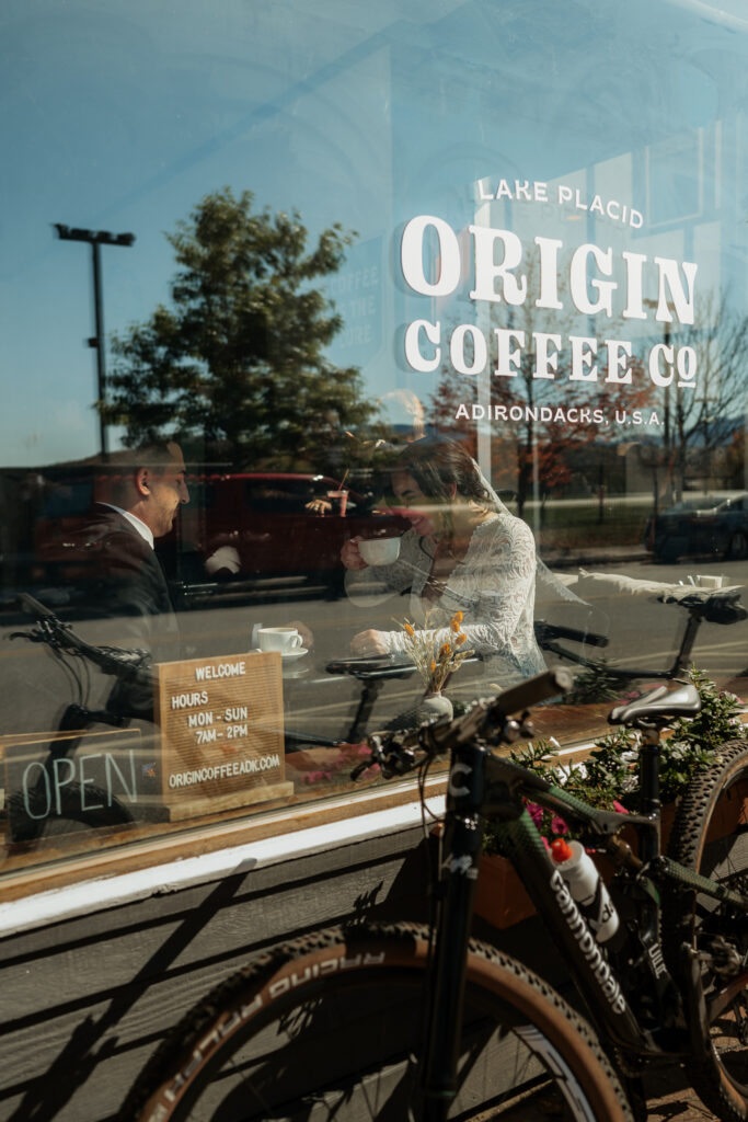 Origin coffee co storefront eloping couple