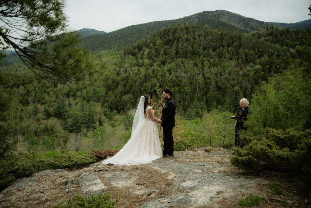Air Bnb Elopement at mountain summit on gloomy day